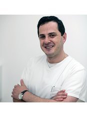 Dr Tim Meskhi