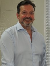 Dr Charlie Stephanakis